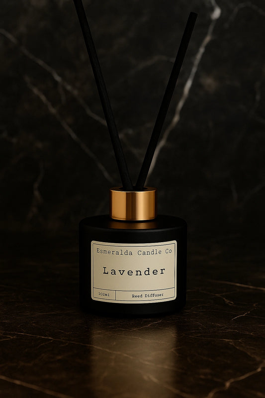Lavender reed diffuser by Esmeralda Candle Co, 100ml black bottle with gold collar and black reeds, relaxing floral home fragrance
