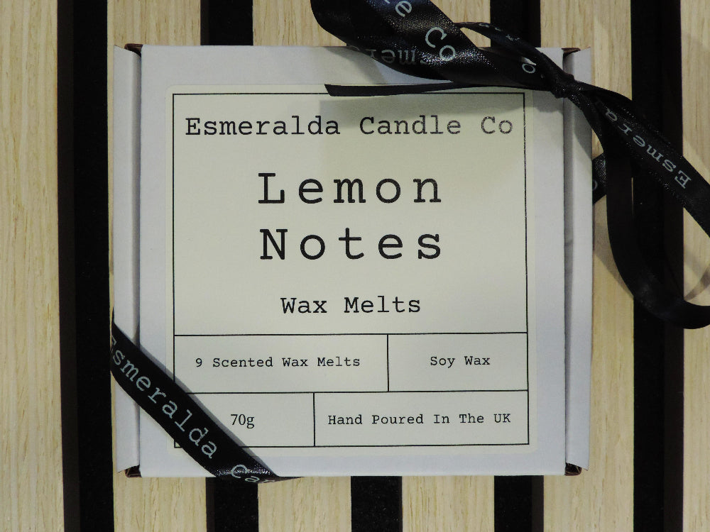 lemon notes scented white box of wax melts with a ribbon around