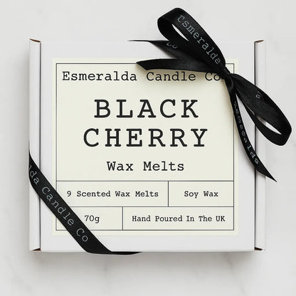 Esmeralda Candle Co Black Cherry wax melts in a white gift box with black ribbon, labelled 9 scented soy wax melts, 70g, hand poured in the UK.