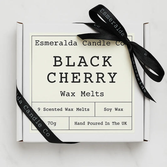 Esmeralda Candle Co Black Cherry wax melts in a white gift box with black ribbon, labelled 9 scented soy wax melts, 70g, hand poured in the UK.