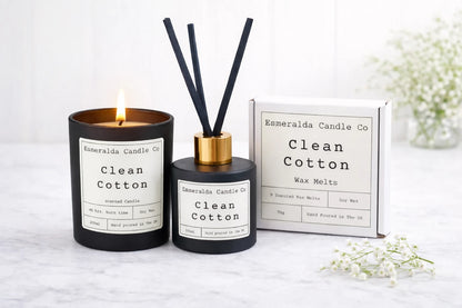 Esmeralda Candle Co 'Clean Cotton' candle and diffuser set on a white surface with a white background.