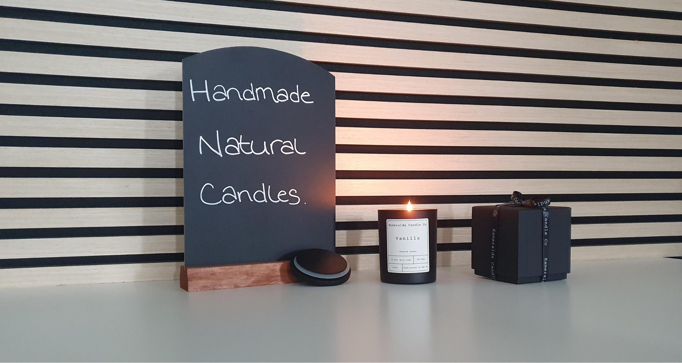 candle, goft box and sign all in matt black