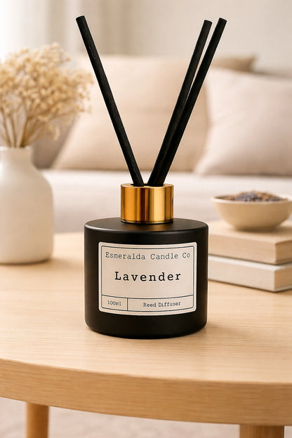 Lavender reed diffuser by Esmeralda Candle Co, 100ml black bottle with gold collar and black reeds, relaxing floral home fragrance.