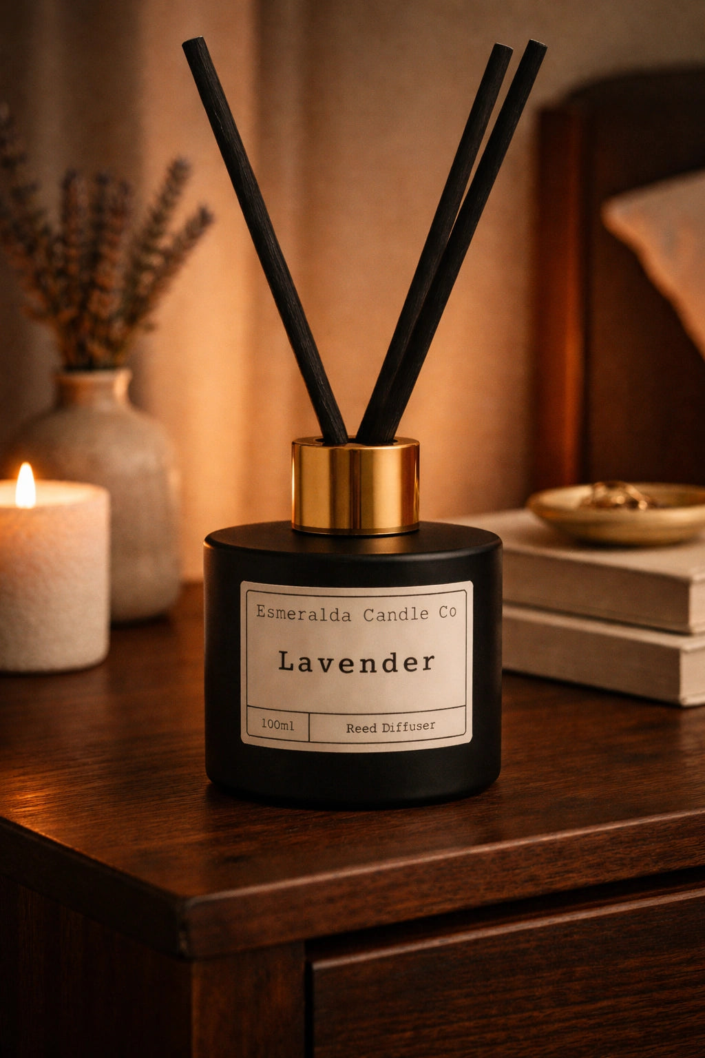 Lavender reed diffuser by Esmeralda Candle Co, 100ml black bottle with gold collar and black reeds, relaxing floral home fragrance.