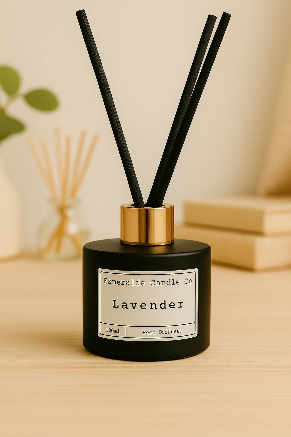 Lavender reed diffuser by Esmeralda Candle Co, 100ml black bottle with gold collar and black reeds, relaxing floral home fragrance.