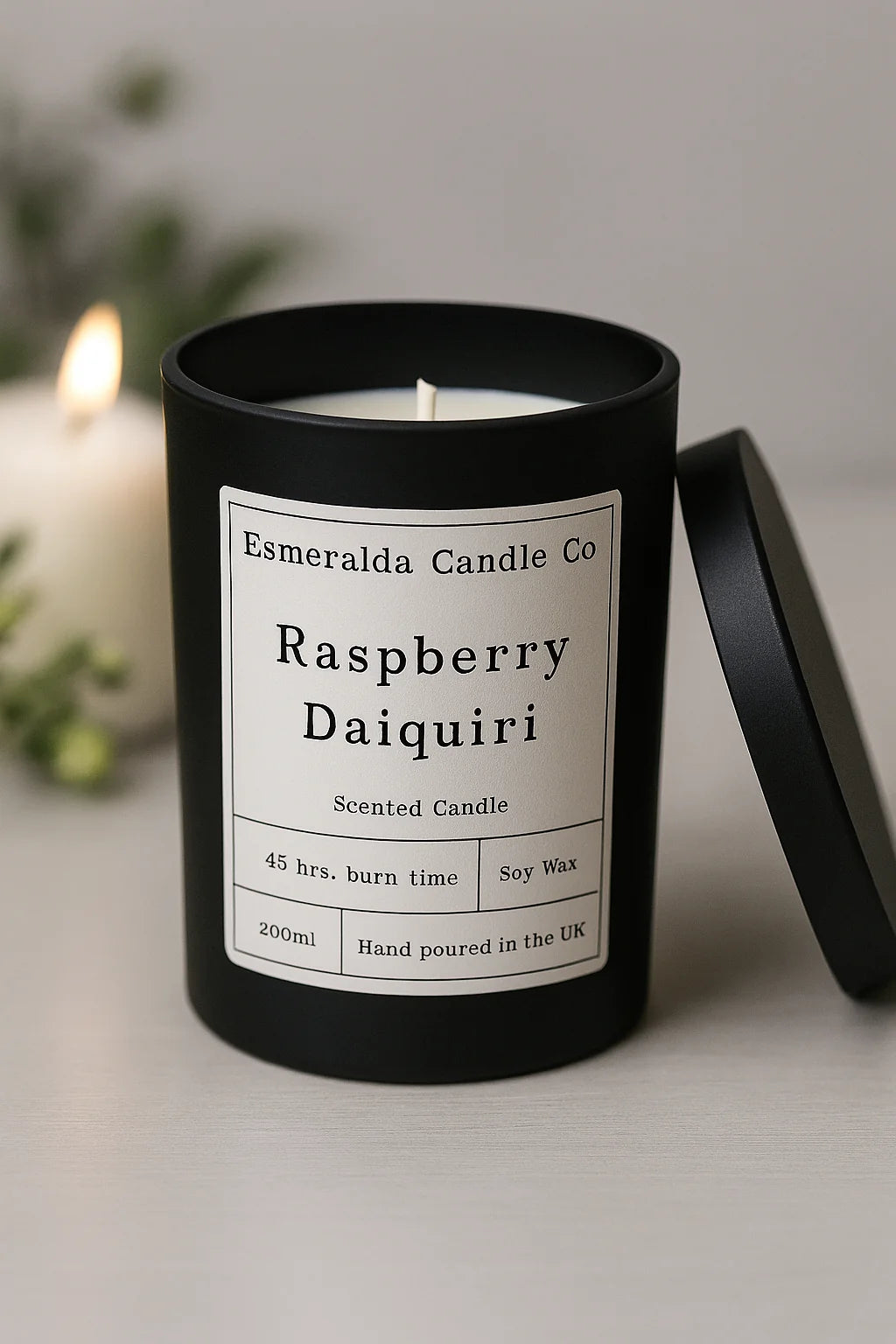 Esmeralda Candle Co Raspberry Daiquiri scented soy wax candle in matte black jar with lid, 200ml, hand-poured in the UK, fruity home fragrance with 45-hour burn time.